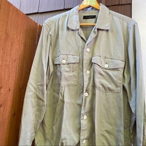 Beautiful light green revere collar shirt.